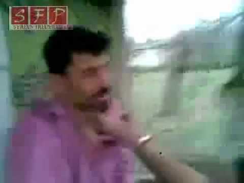 عصابات الامن السوري يقومون باذلال مواطن