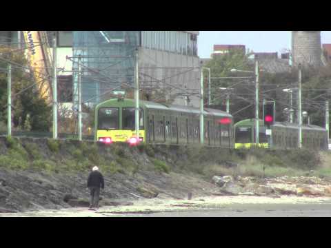 Booterstown HD-Irish Rail 8500 class dart no.8601 departs by the coast with new logos
