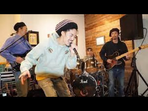 Youth of Roots, Japanese reggae band nice up Kingston Night Market.