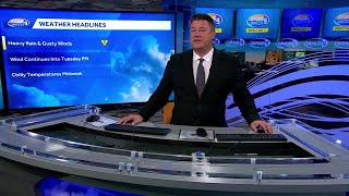 Video: Heavy rain & gusty winds move through