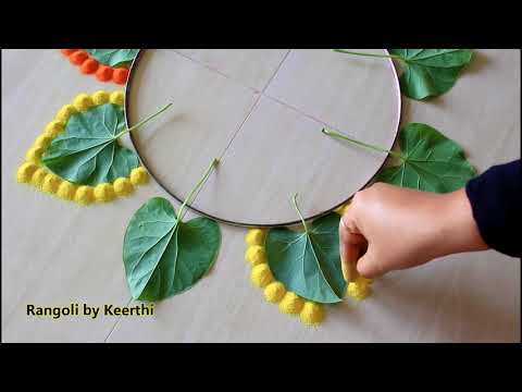 beautiful diwali rangoli design with leaves by keerthi