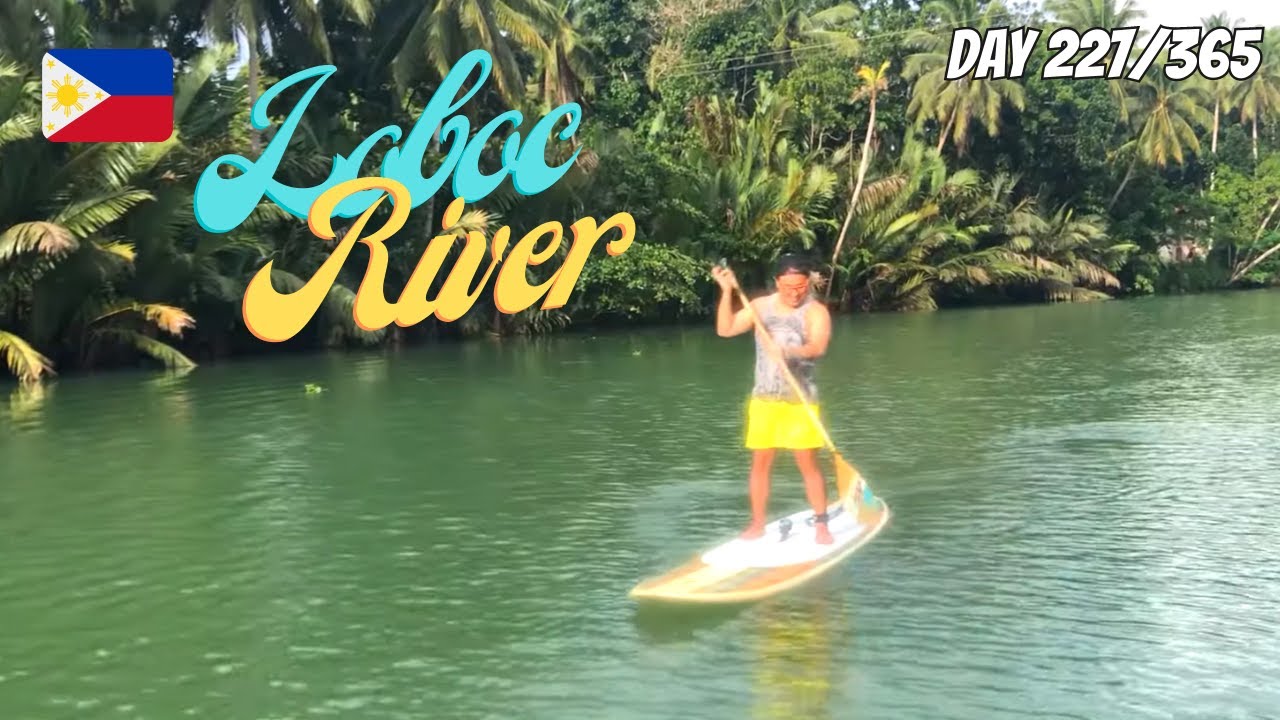 Join tourists as they indulge in Loboc river paddleboarding.