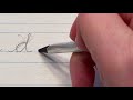 Lowercase "d" in cursive