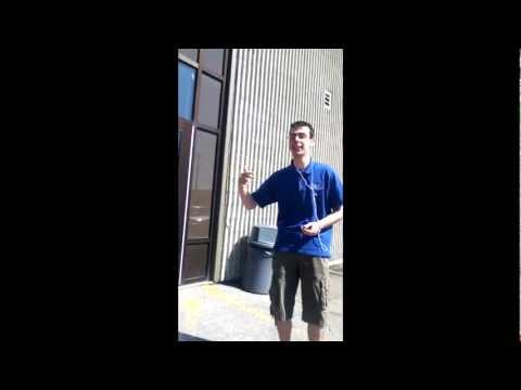 Strange hobo singing a song in front of a school