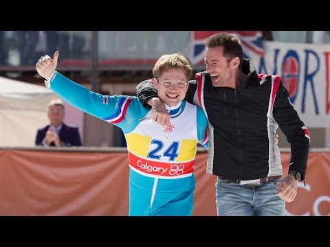 Trailer frame: training montage in Garmisch; bright synth score nods to 1988 pop