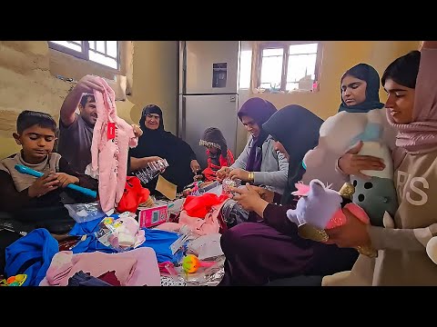 Unboxing a giant box full of gifts for the Grandma's family