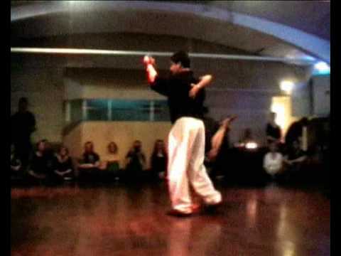  Carlos Espinoza  and  Mamié Sancy  are  dancing  to  the  tango  "  Ensunos  "