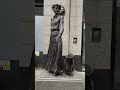 Bronze statue in Dublin.  Woman and dog.