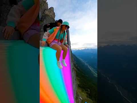Glowy Cliff Slide is Fun 😱🔥 Girl Slides then Flies over Airbag! #cliffactivity #cliffslide