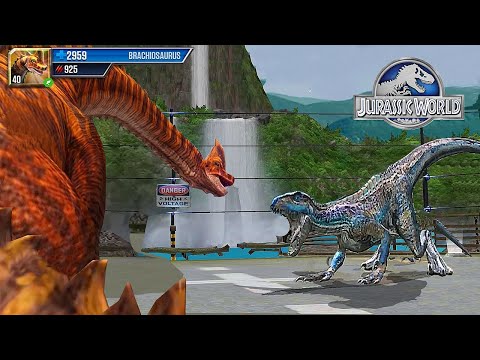 BRACHIOSAURUS VS INDORAPTOR GEN 2 - JURASSIC BATTLE || JURASSIC WORLD THE GAME