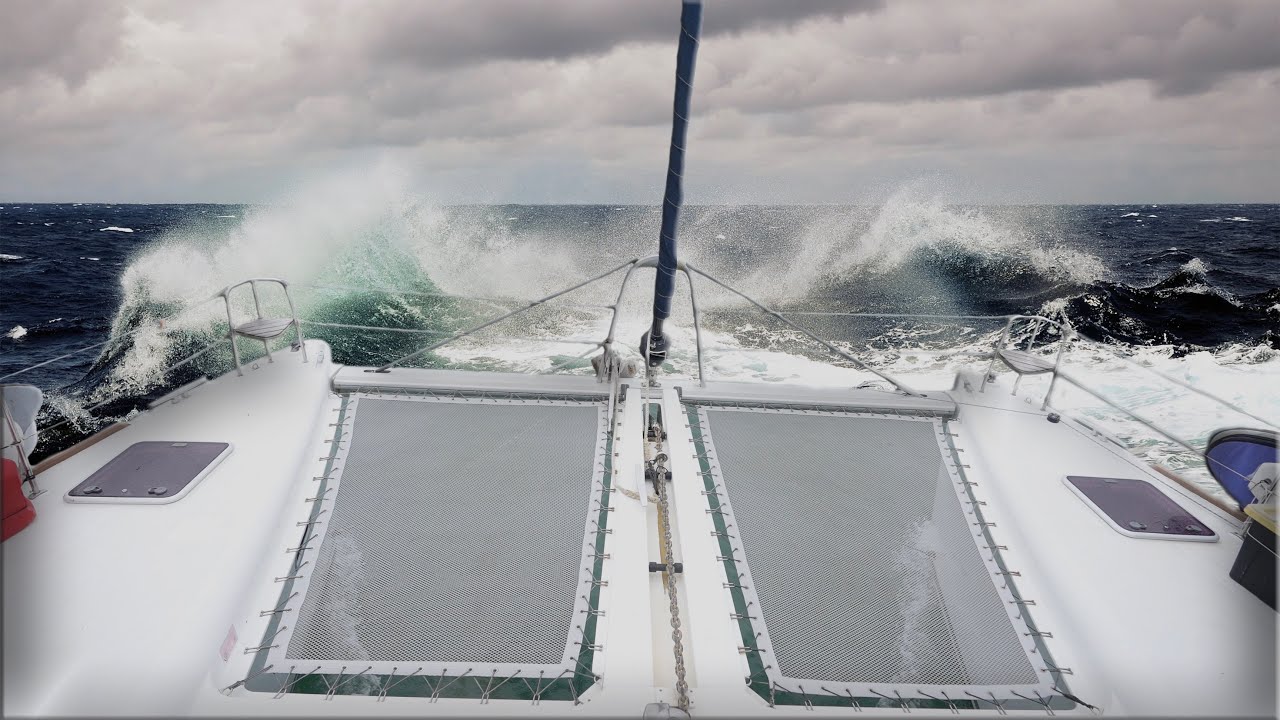 HURRICANE DAMAGED CATAMARAN getting SMASHED by the elements! - (Episode 198)