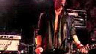 Paul Holmes Performing with Pitty Sing