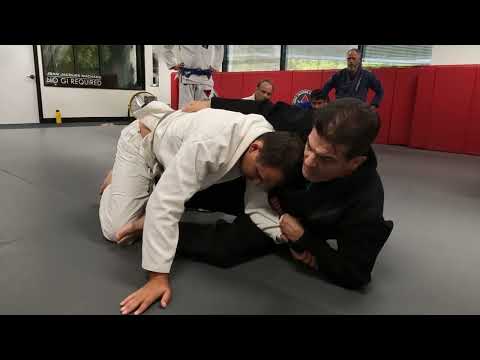 Back takes and rolling arm bars (outside hook sweep setup)