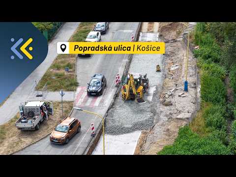Náhľad videa Na Popradskej už pracujú mechanizmy. Spevní sa podložie a pribudnú štrbinové žľaby