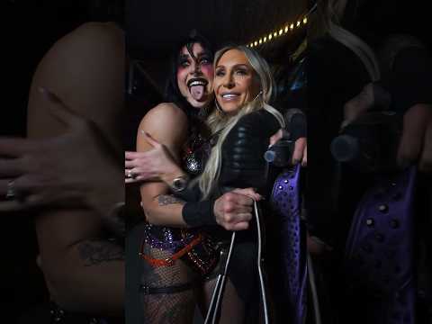 Awesome moment between Rhea Ripley and Charlotte Flair at #WrestleMania! 🖤💛