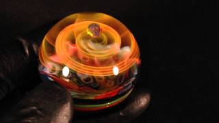 Fume spiral over color tubes marble