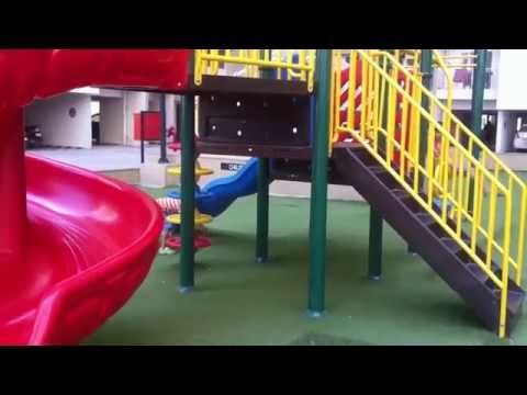 Children Playing In The Park With Roundabouts, Swing, Slide, SeeSaw by JeannetChannel Video