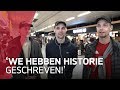 Supporters komen aan op Schiphol