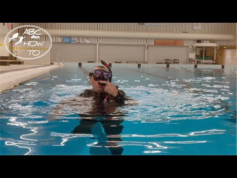 Oral BCD inflation at surface - PADI Open Water Diver Course demo