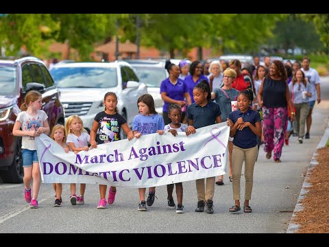 Walk and candlelight vigil in Columbus, Georgia honors, remembers domestic violence victims