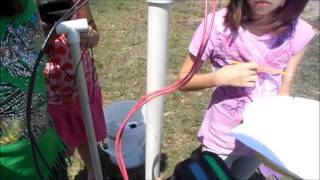 Kids use LandMapper to measure soil EC (electrical conductivity)