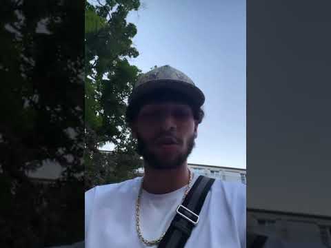 Lucio kauft einem jungen Süßigkeiten und wasser ab