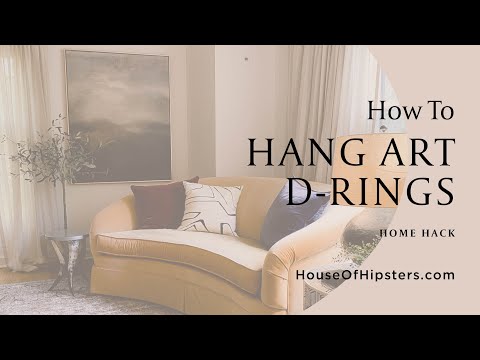 How to hang art with D ring hooks. Secret home hack. #homedecor #interiordesign #diyhomedecor #diy