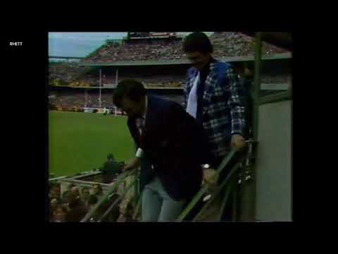Ron Barassi running down from coaches box during last quarter of 1975 Grand Final. ABC footage