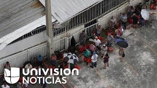 Largas filas para conseguir alimentos, medicinas, combustible y dinero en Puerto Rico