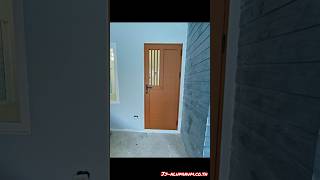 ชุดประตูบานเปิดทึบหน้าบ้านลายไม้สักทองพร้อมช่องแสงแปะลายลูกฟัก