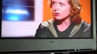 Rosie showing off  schoolgirl French on local TV, with kids sabotaging film