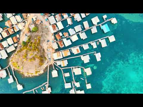 Golden Hour Over Hanuabada Village | Drone View of Papua New Guinea’s Iconic Coastal Village.