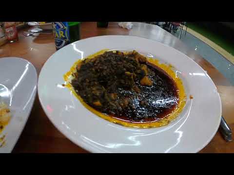 Day 1 in Sierra Leone. Eating rice and pɛtɛtɛ leaf at the Gateway hotel in Lungi.