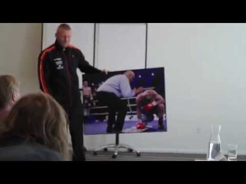 Patrick Nielsen gives Rudy Markussen a special welcome back gift