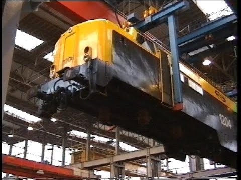 NS werkplaats Tilburg met o.a. Lok 1100, 1200, 1300, 1500, 1600, SIK, 6400 en de wielenafdeling.