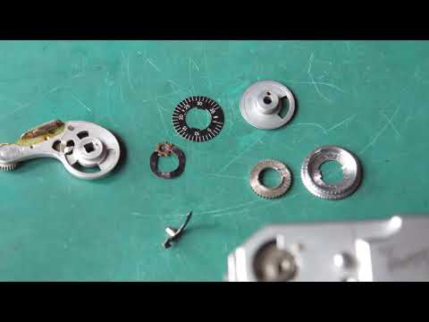 Retina Ia and IIa film advance lever assembly