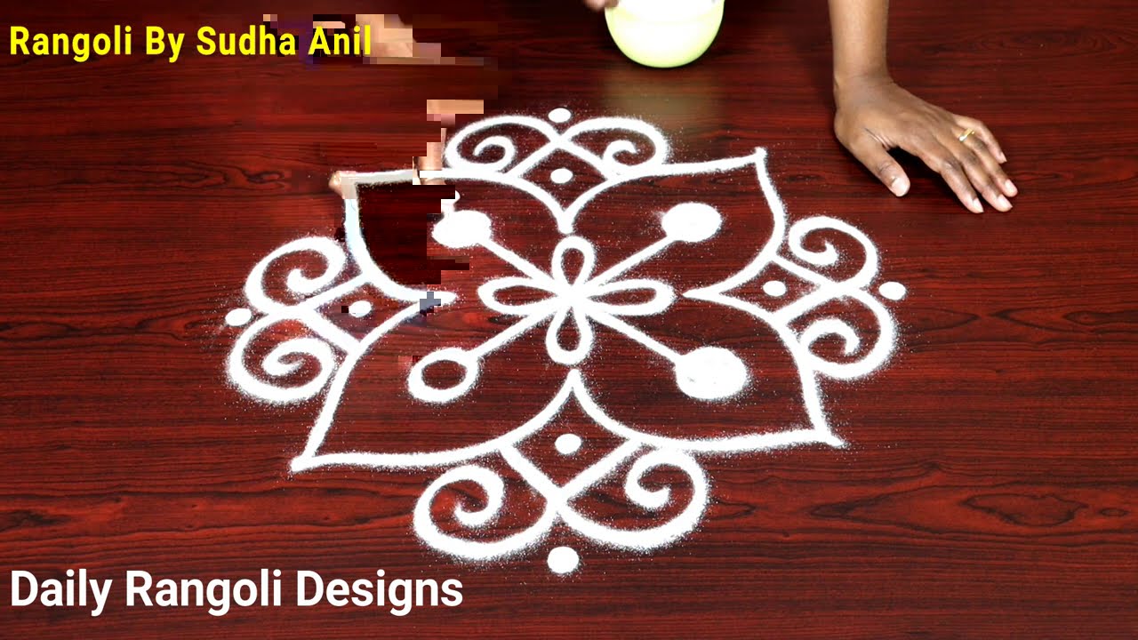 simple rangoli design with 2 dots by sudha anil