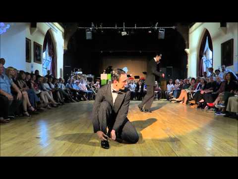  Enrique De Fazio  and  Guillermo de Fazio  are  dancing  to  the  milonga  "  Reliquias Porteñas  "  by  Francisco Canaro  at  England International Tango Festival  in  2015