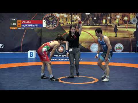 1/4 FS - 57 kg: A. SARLAK (IRI) v. N. HAJIAGHANIAS (IRI)