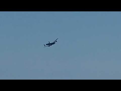 Lancaster Bomber flying off into the sun at Clacton Air Show 2022