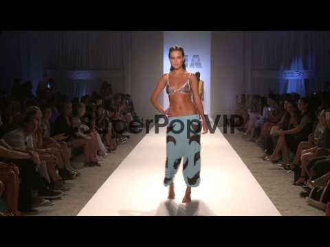 Models walk the runway during Minimale Animale - Mercedes...