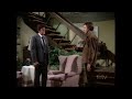 Mannix Is Held at Gunpoint by John Ritter at the Brady Bunch House