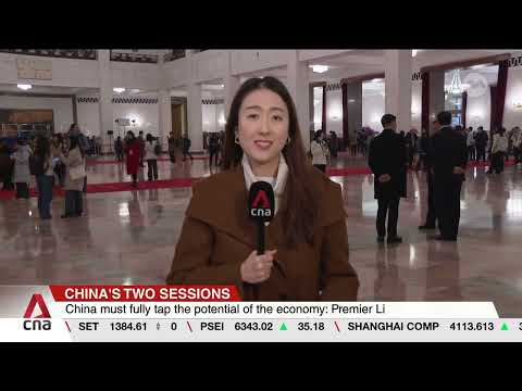 China sets lower GDP growth target, vows to boost ...