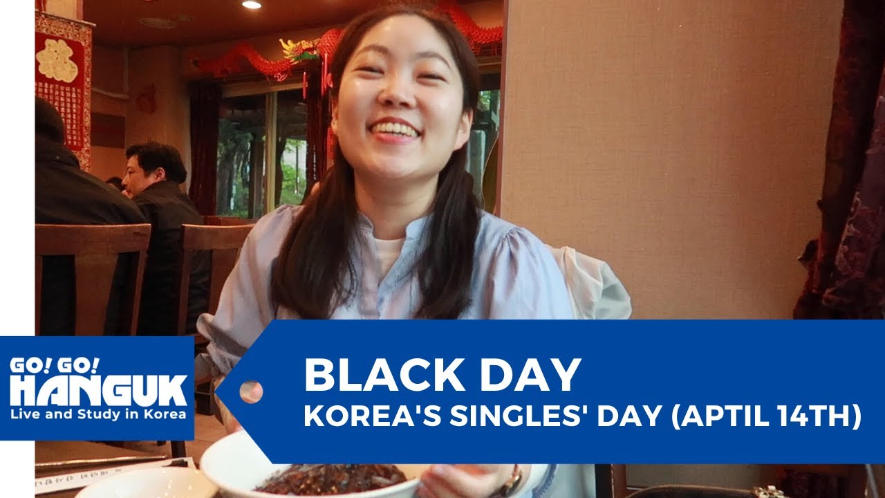 Korean friends eating black jajangmyeon noodles together on April 14 Black Day in Seoul wearing dark colored clothing