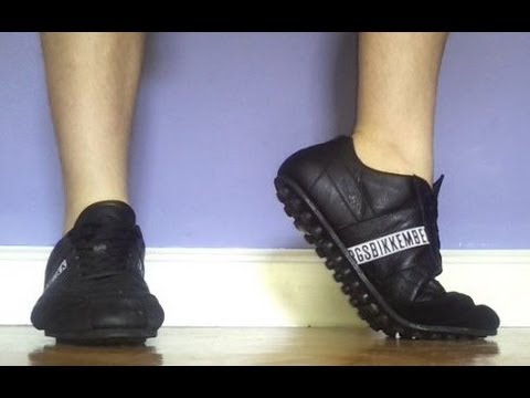 Bikkembergs black sockless barefeet