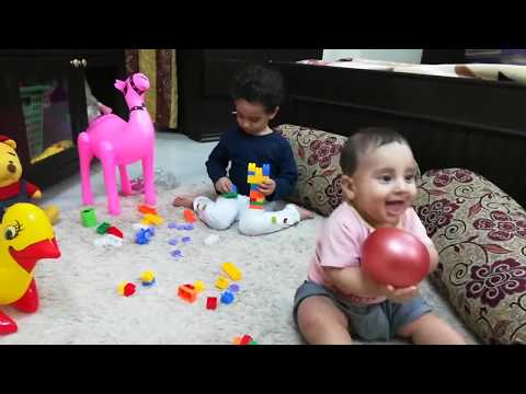 Aira and Zargham playing with blocks #40