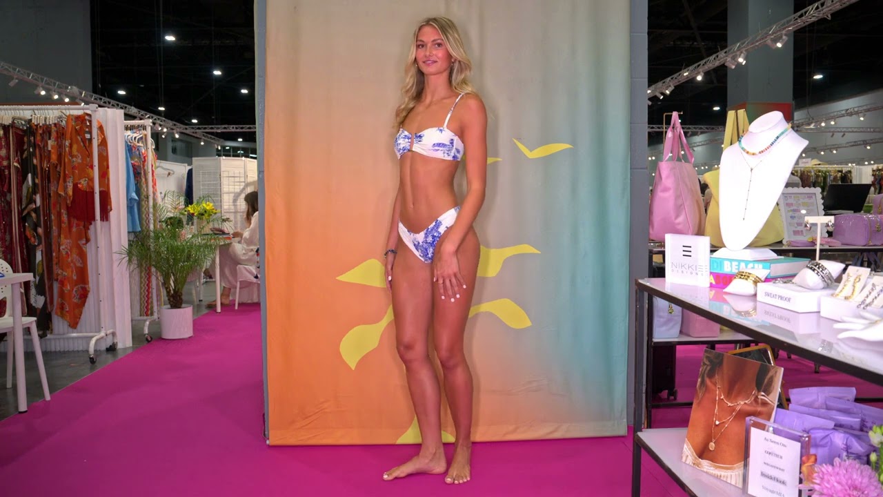 Swimsuit model Bella Deere poses in 2nd Agua Clara at Cabana Swim Show / Miami Beach Conv. Center