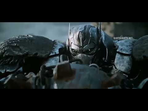 Optimus about to kill Battle Trap but Monke steals it and smashes Battle Trap with his big balls