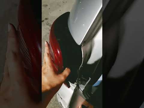 Remove brake light/turn signal bulb. Replace with new bulb. Installation is reverse of removal