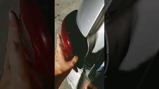 Remove brake light/turn signal bulb. Replace with new bulb. Installation is reverse of removal